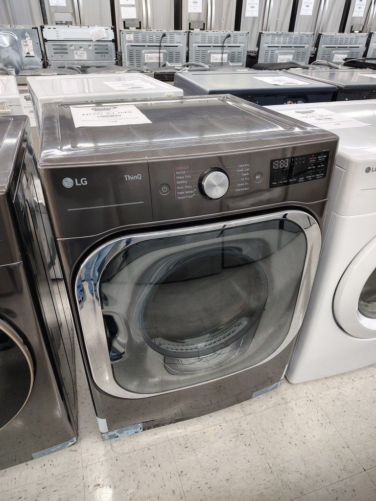 $1049 LG 9.0 Cu Ft Mega Capacity Smart Wi-Fi Enabled Front Load Gas Dryer with TurboSteam and Built In Intelligence