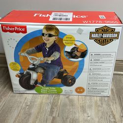 Fisher-Price Harley-Davidson Toddler Tricycle Tough Trike Bike with Handlebar Grips and Storage for Kids