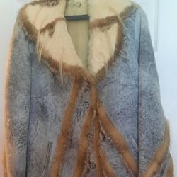 💯% Shearling Jacket W/Raccoon Fur Trim. Negotiable 