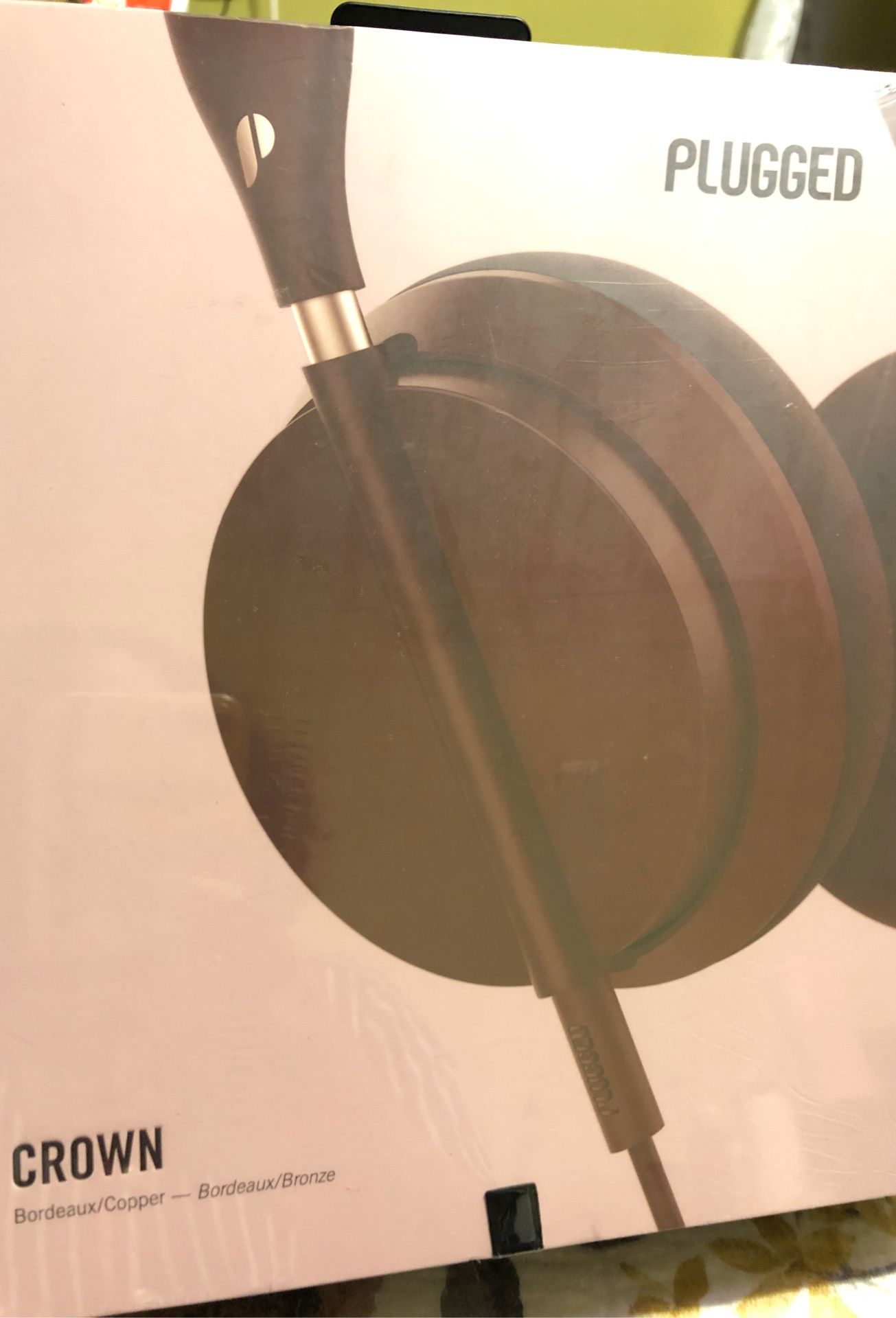 Plugged Crown over the ear wired headphones