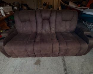Power Reclining Sofa with Drop-Down Console and Charging Station