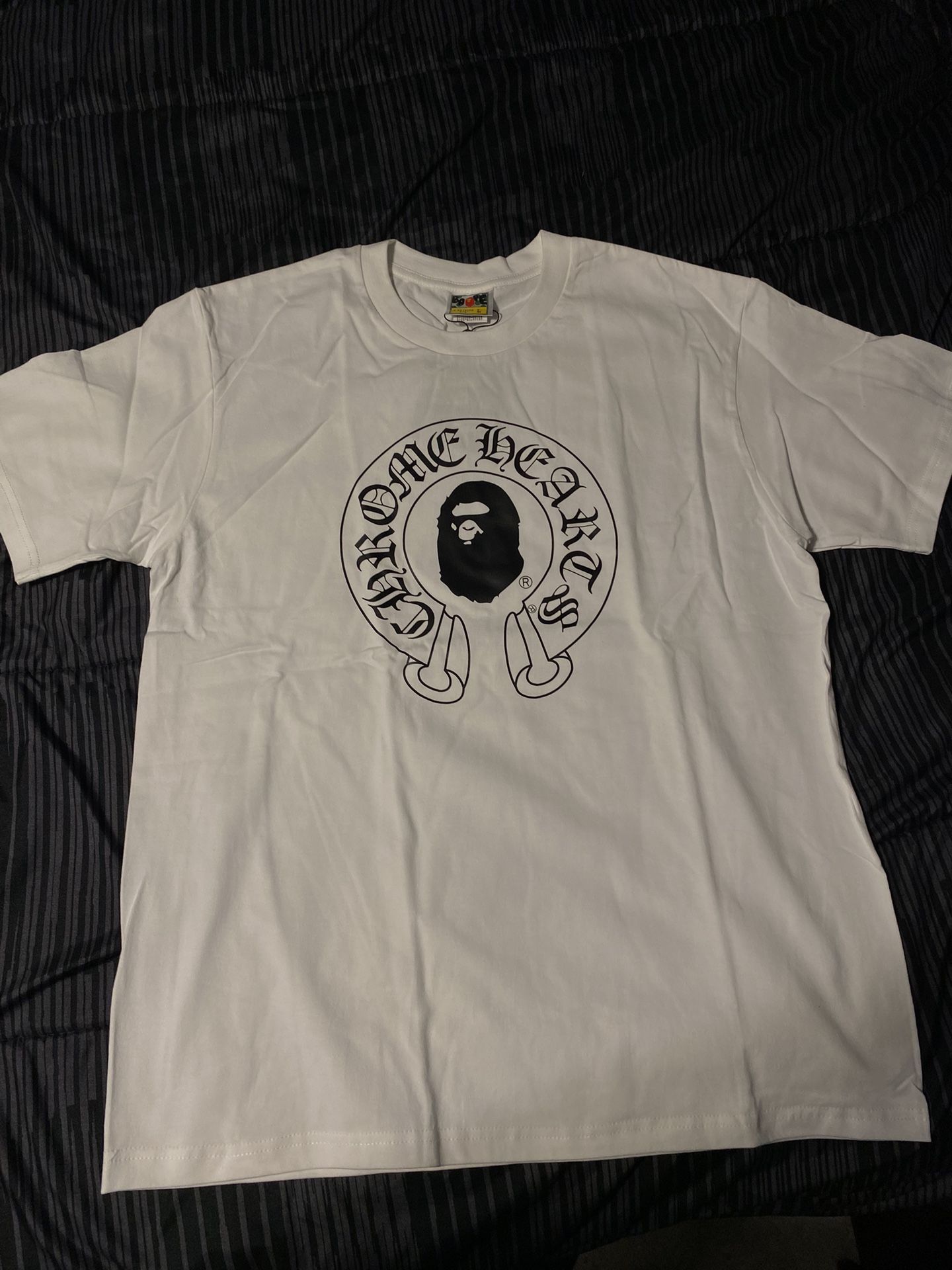 White bape/chrome hearts shirt.