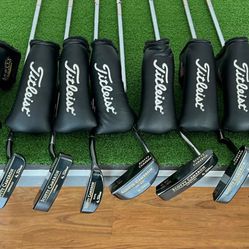Set Of Putters & Covers