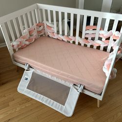 Infant/Toddler bed with mattress and side protection border
