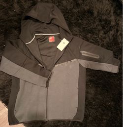 Nike tech fits like L