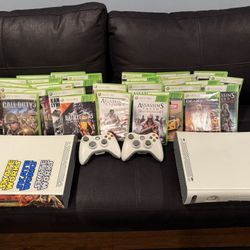 Two Xbox 360, 3 Controllers and 29 Games
