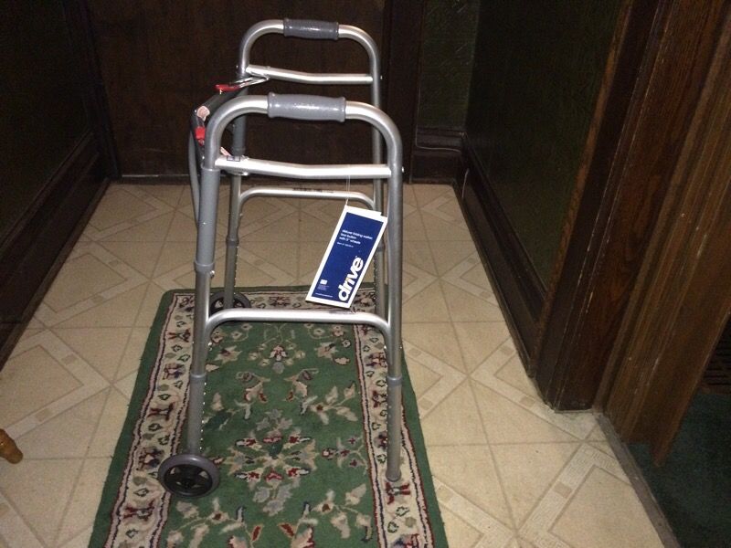 Adjustable walker with wheels.