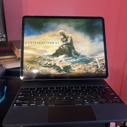 iPad Pro (6th Gen) - Silver and Black Magic Keyboard 