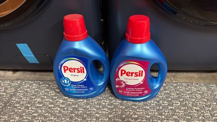 2 bottles of persil detergent 84fl oz