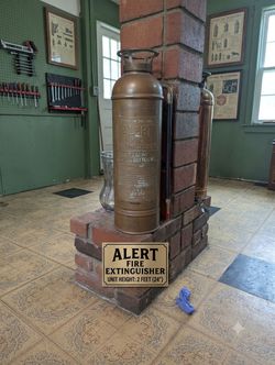 Antique alert cooper fire extinguisher