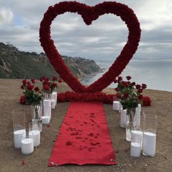 Love Proposal with Red Heart Flower Arch