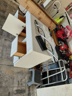 Cabinet , vanity top and light