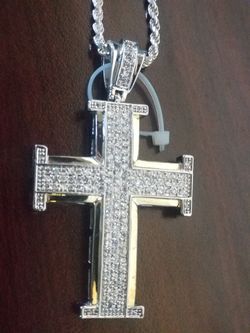 Silver rOPpe chain with a stainlesss steele cross with zirconia stones
