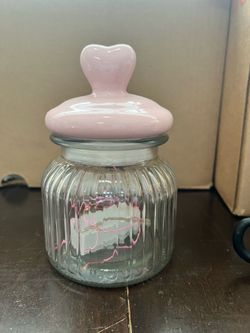 Glass treat jar with pink heart lid