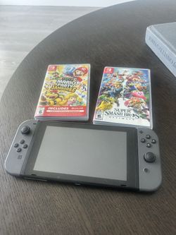 Nintendo Switch + 2 Games 
