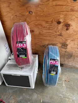 Apollo PEX 1/2 in. x 300 ft. Red and blue PEX-A Expansion Pipe in Solid