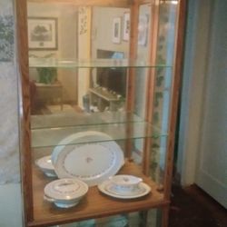 MUST SELL...leaving town tomorrow/Lighted curio cabinet 