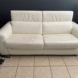 White leather sofa bed