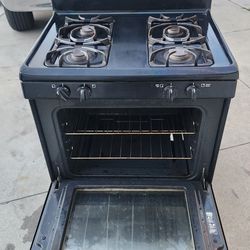 Untested, black and stainless frigidaire stove