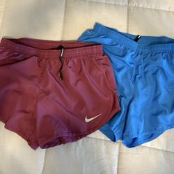 2 Pair Of Nike Women’s Running Shorts 