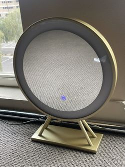 Round vanity light