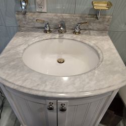 Vanity With Marble Top And Kohler Faucet