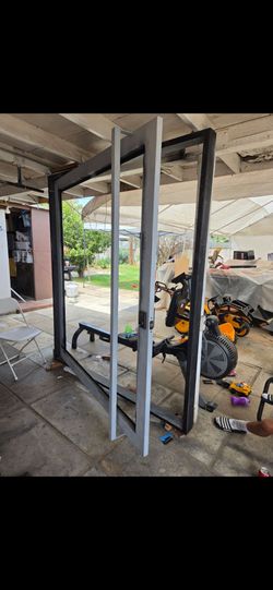 72 x 83 1 /2 steel door$2,700 or best offer.