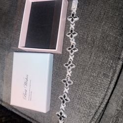 vvs diamond Cross Flower braclet