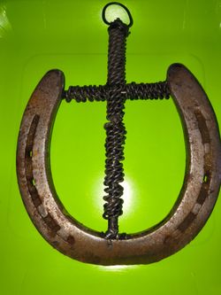 Horse shoe with cross