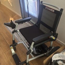 Beautiful scooter/electric wheelchair. The chair has multiple speeds and an extended battery