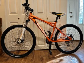 Jamis Trail X2 bike, great condition. Aluminum frame 17” for rider 5’2-5’7. Dual disc brakes. Wheels 26”, shimano 21 speeds. Just tuned up. No issues.