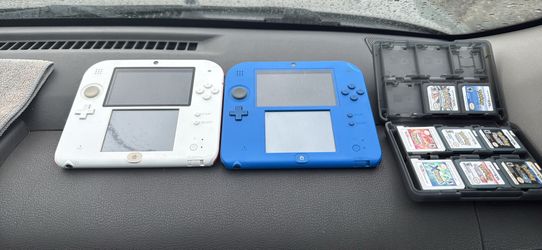 Nintendo 2DS with charger and Pokemon Black 2 game