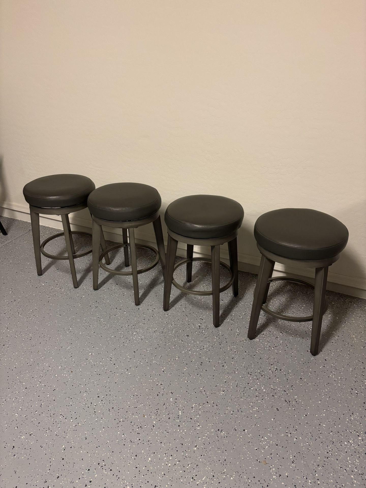 Four Counter Height Swivel Bar Stools