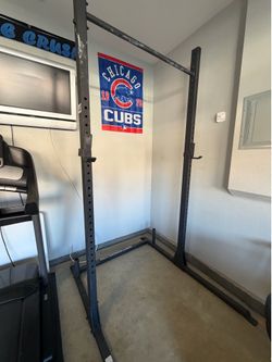 Home gym equipment - Pull up bar/squat rack, bench press with barbell