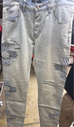 Amiri Light Wash Distressed Denim Jeans