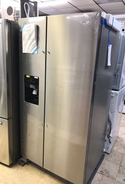Whirlpool Side by Side refrigerator/ 1 year warranty free delivery