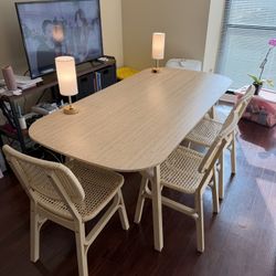 wooden table and 4 chairs