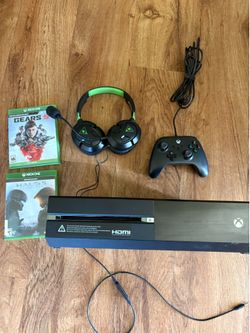 Xbox one. With controller. Headphones and mic. And connections wires
