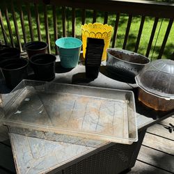 Variety Of Garden Planting Pots And Greenhouse