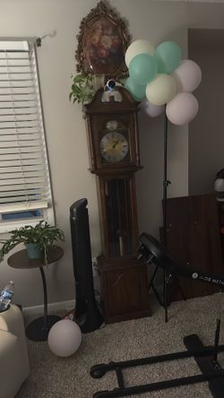 Brown Grand father clock