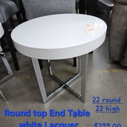 End Table Round White Lacquer We are located at 2811 East Bell road. Another Time Around Furniture.