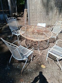 Patio furniture four tables and a chair
