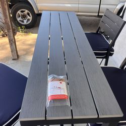 Stools and table set. New never used Has three stools all with cushions 