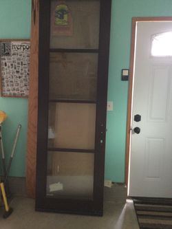 Wood and glass door. 31 1/2 by 96