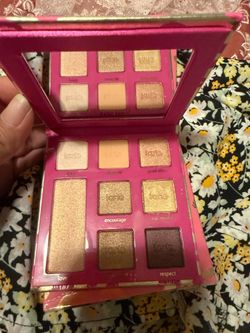 Tarte Cosmetics Leave Your Mark Limited Edition Eyeshadow Palette in a pink and gold themed compact