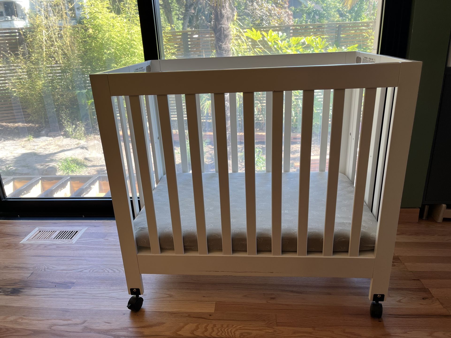 Mini Crib - Folds To Store - With Wheels