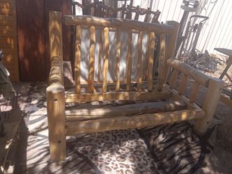 $600 Rustic log loveseat bench