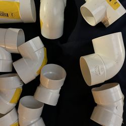 Several Pieces of PVC ELBOWS and connections: SELLING INDIVIDUALLY FOR $3 EACH 