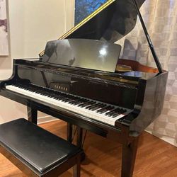 Yamaha baby grand piano in mint condition