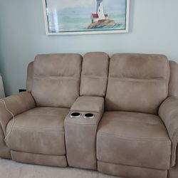 Two Recliner Sofas, Tan In Color, Durable, Easy To Clean Material.